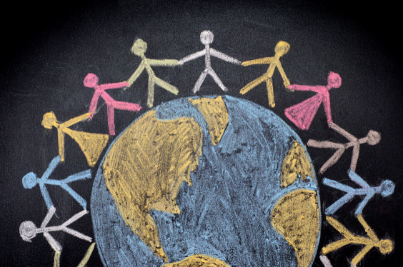 Chalk drawing of the earth with stick people arounf the circumference of the globe holding hands.