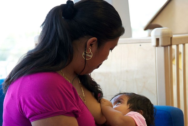 Woman breastfeeding her baby.