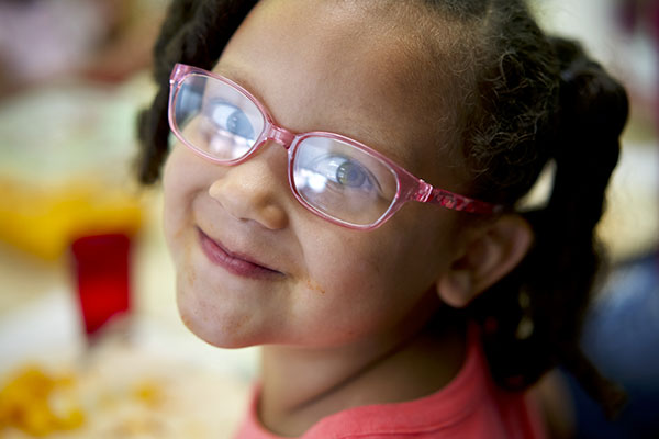 Child wearing glasses.