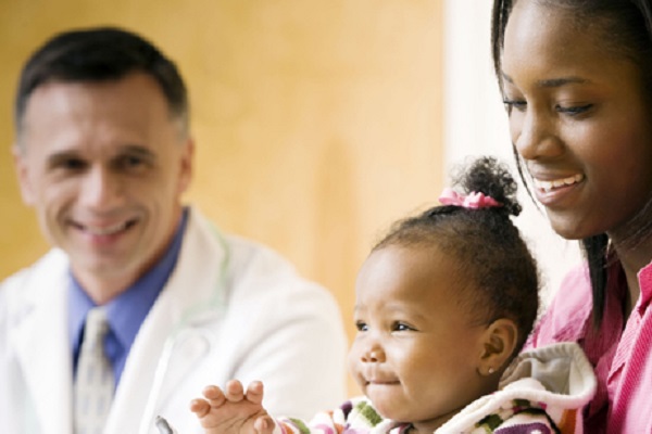 Mother and child visiting the doctor.