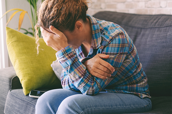 Woman feeling sad or worried.