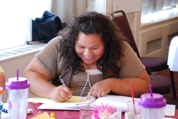 Woman doing her homework for college.