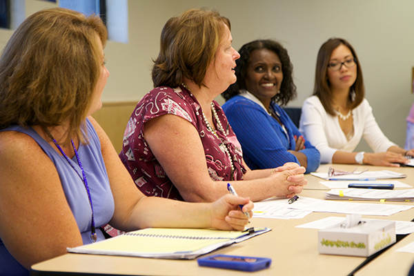 Woman speaking out in a meeting.