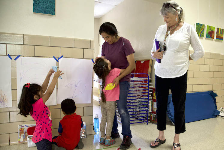 Children in school with teachers