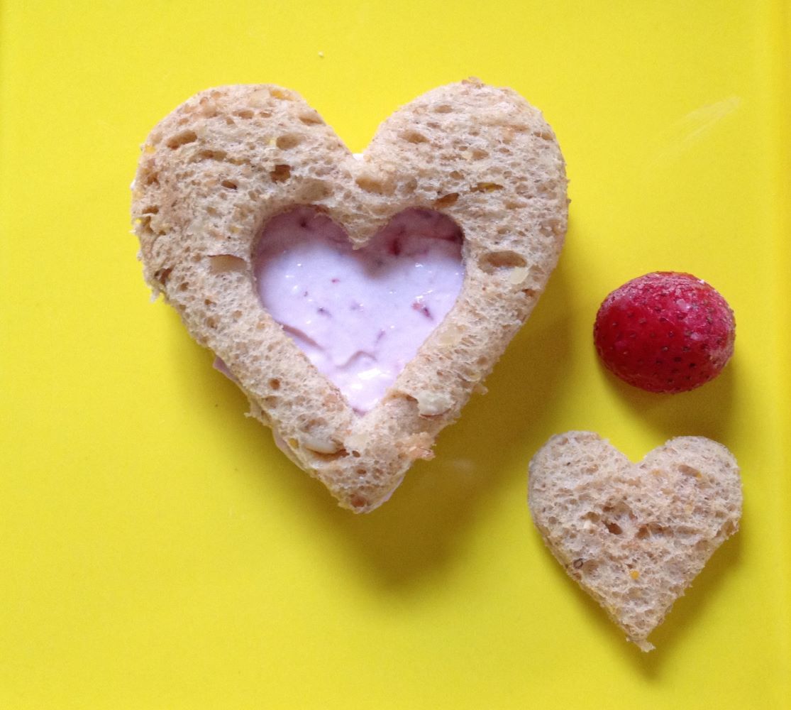 Strawberry cream cheese heart sandwiches.