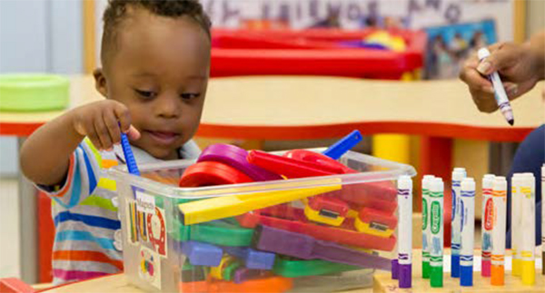 Child playing with toys