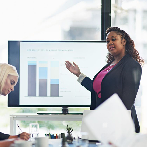 Woman giving a slide show presentation