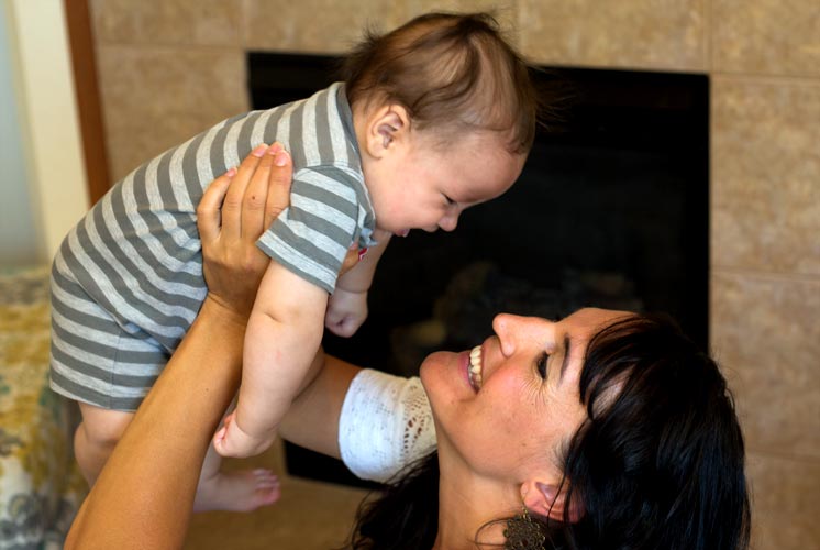 woman playing with child