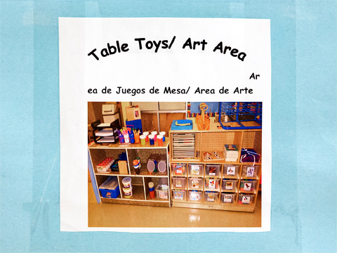 table toys/arts area sign