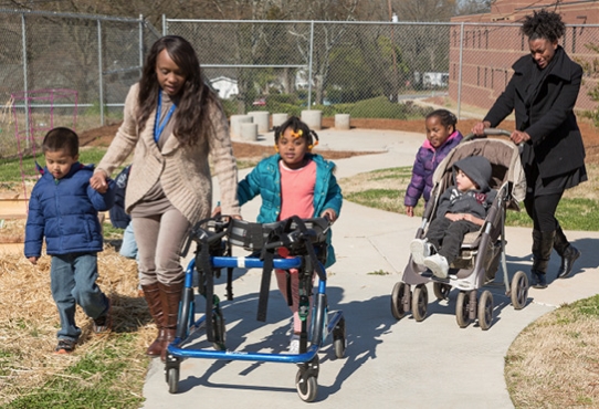 Families walking with their children