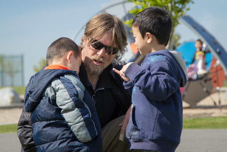 Father talking to his children