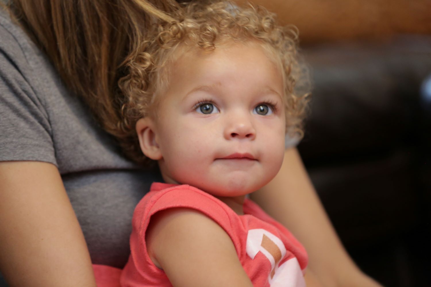 Toddler looking into the camera.