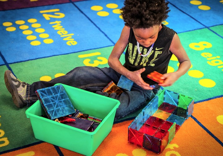 Little boy playing with blocks