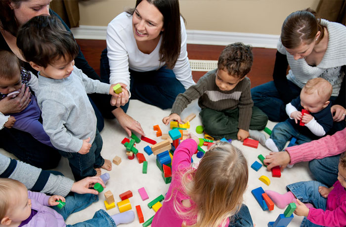 Teacher with students in a circle