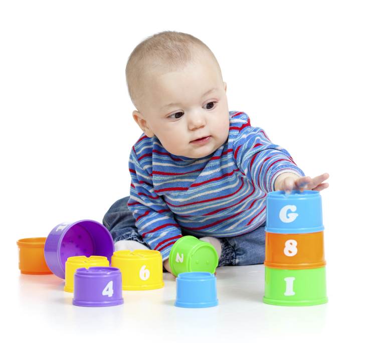 baby playing with blocks