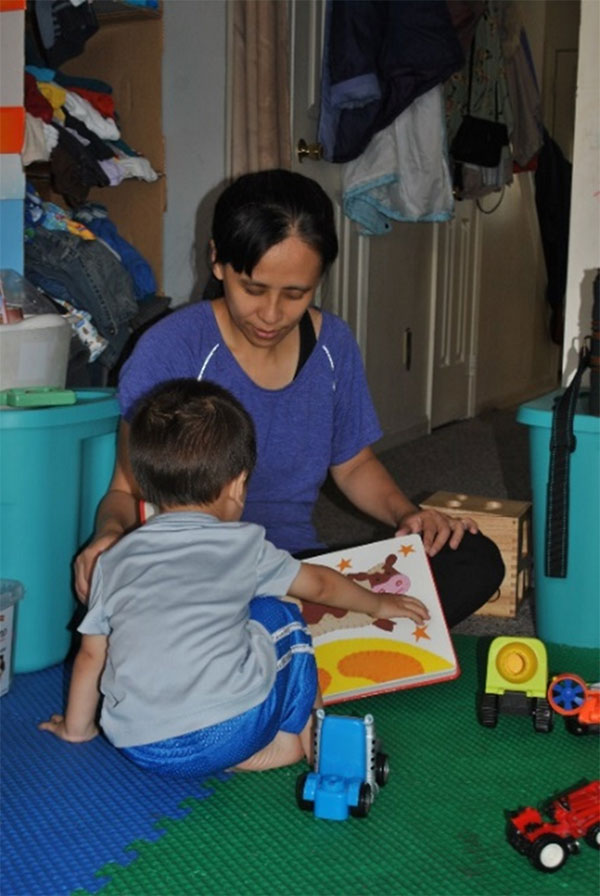 Teacher reading with a child