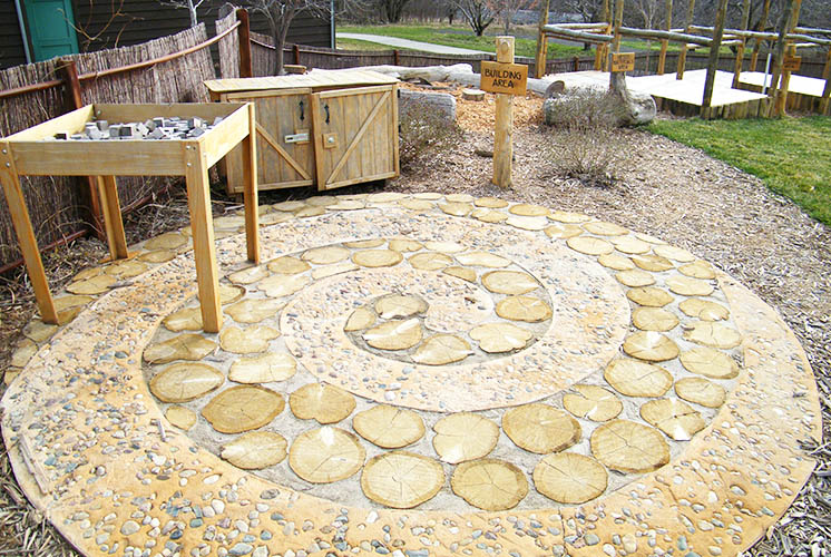 a spiral path made of rock and tree