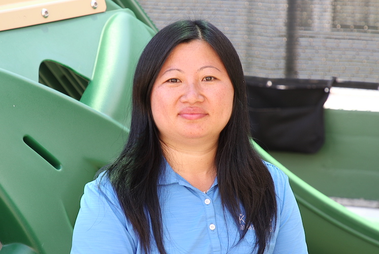 Woman staring at the camera smiling