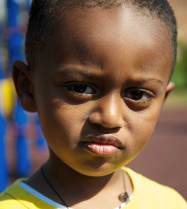 Young child in yellow shirt