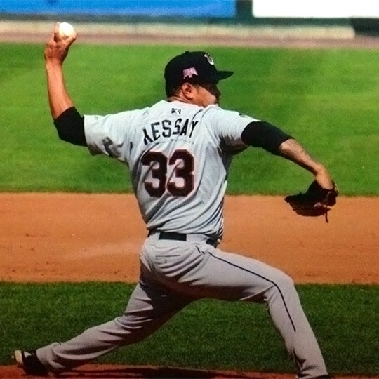 Sabastian Kessay pitching a baseball