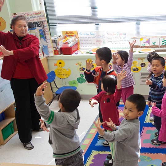 Teacher leading students in physical activity